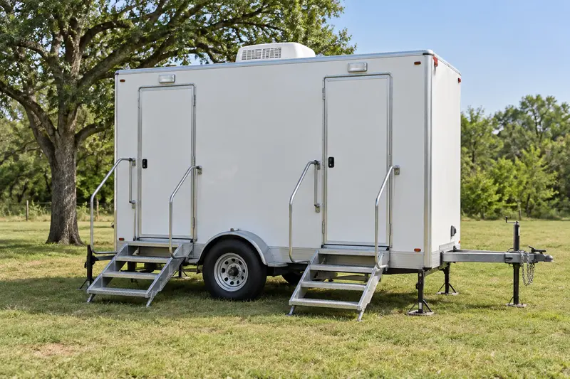 Restroom trailer with entry steps